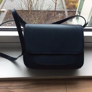 Neely and Chloe navy leather oversized clutch
